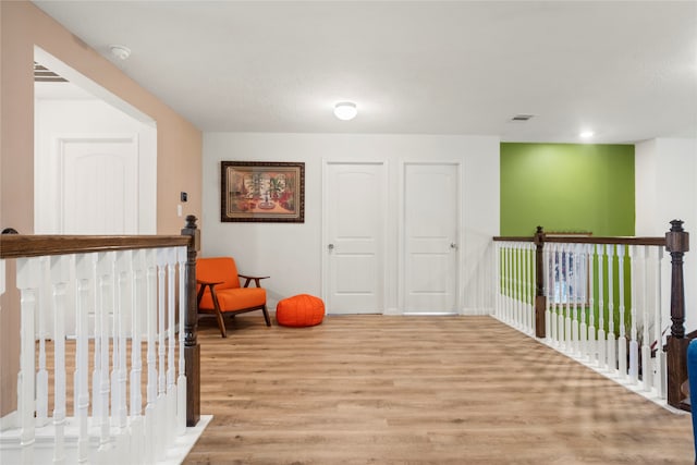 interior space featuring access to outside and light hardwood / wood-style flooring