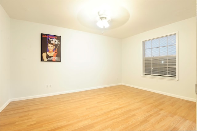 empty room featuring ceiling fan and light wood-type flooring