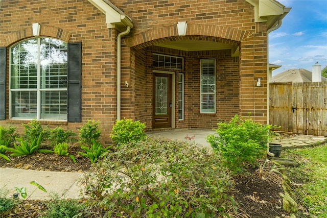 entrance to property with a patio area