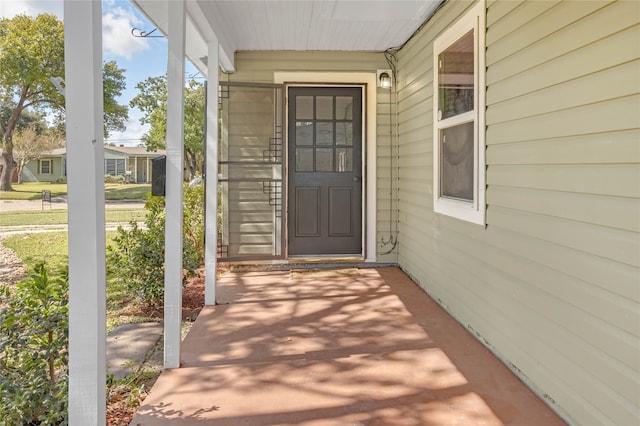 property entrance with a porch