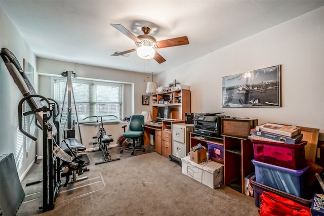 office space with carpet flooring and ceiling fan