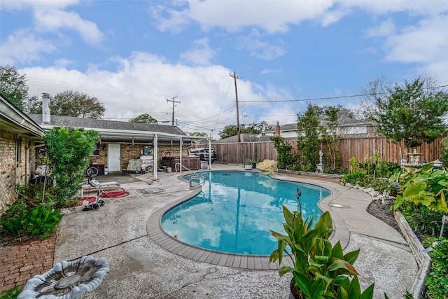 view of pool featuring a patio area