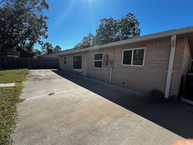 back of house with a patio area