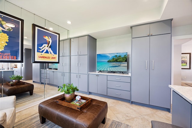 7109 Broadway St, Galveston, TX 77554 - living area featuring light tile patterned floors and recessed lighting