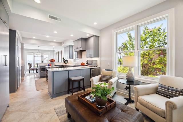 7109 Broadway St, Galveston, TX 77554 - living area with a toaster, light tile patterned floors, recessed lighting, and visible vents