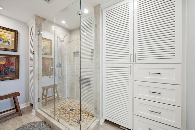 7109 Broadway St, Galveston, TX 77554 - full bath featuring baseboards, a stall shower, and visible vents