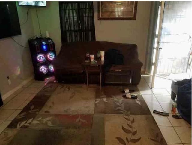 6516 Sidney St Unit A, Houston, TX 77021 - living room with light tile patterned floors