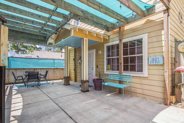 view of patio / terrace featuring a pergola