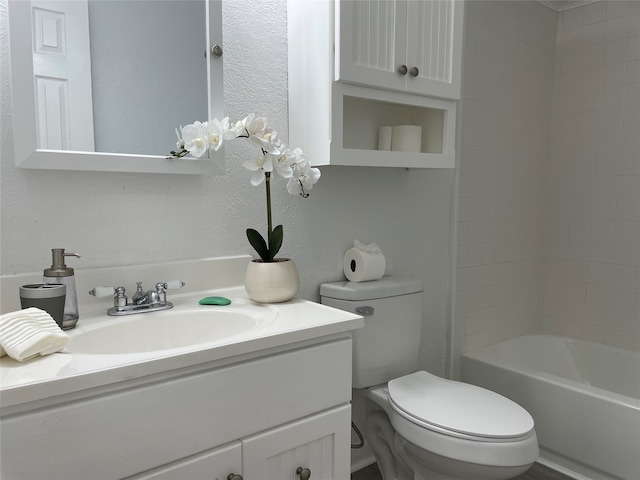 full bathroom with vanity, toilet, and tiled shower / bath combo