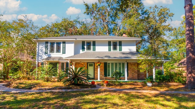 view of front of home featuring a front yard