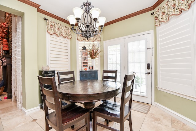 dining area featuring a notable chandelier, crown molding, baseboards, and light tile patterned floors