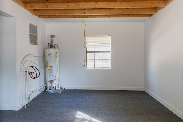 interior space with water heater and wooden ceiling