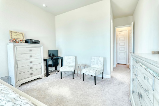 bedroom with light colored carpet