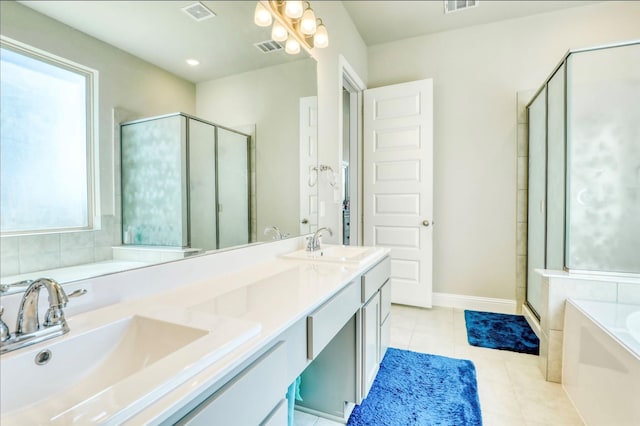 bathroom featuring tile patterned flooring, vanity, and independent shower and bath