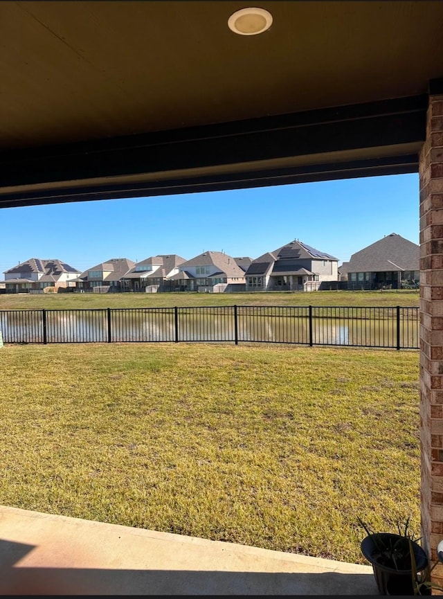 view of yard with a water view