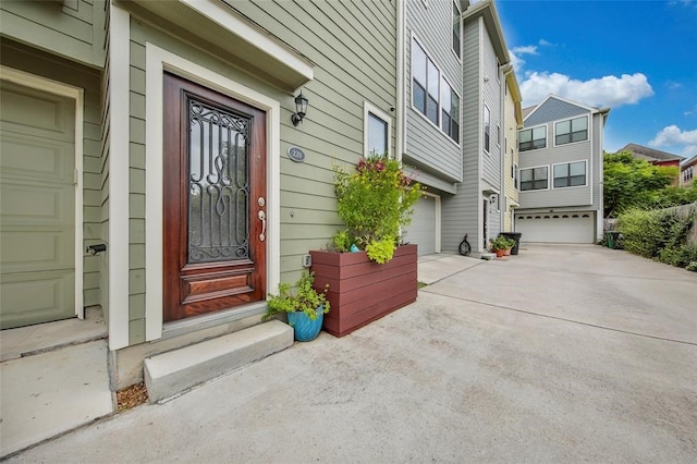 property entrance with a garage