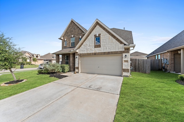 view of front facade featuring a front yard and a garage