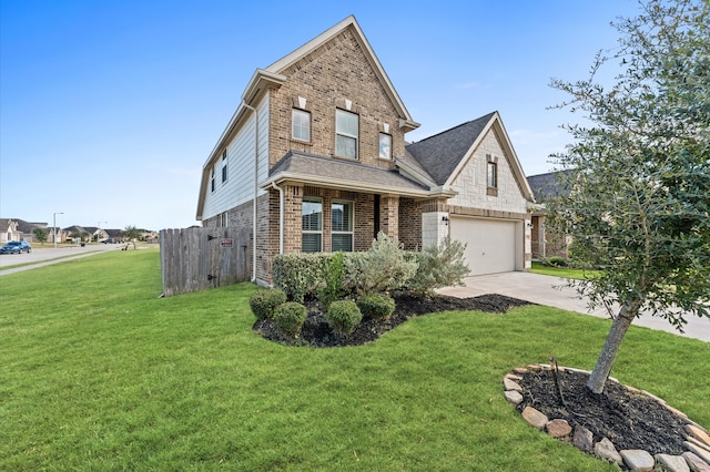 view of front of home with a garage and a front lawn