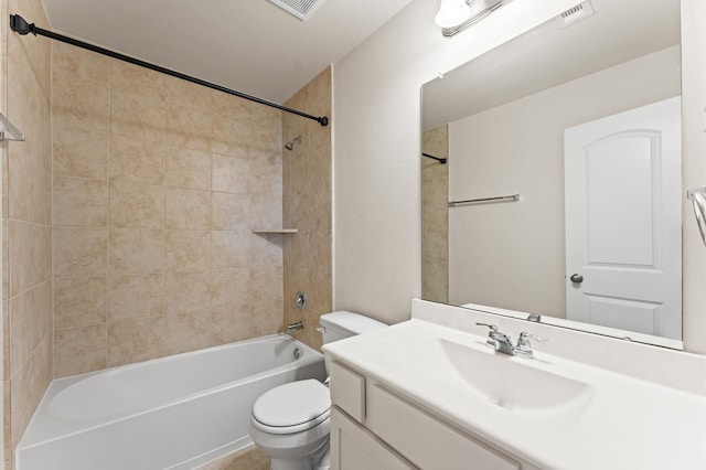 full bathroom with vanity, toilet, and tiled shower / bath combo