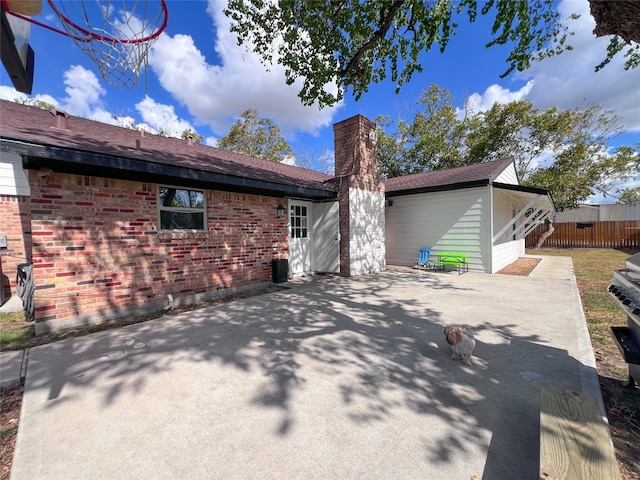 back of property with a patio area