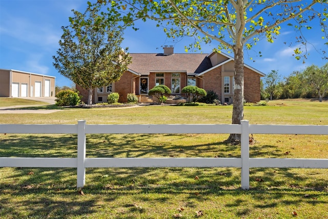 ranch-style house with a garage and a front lawn