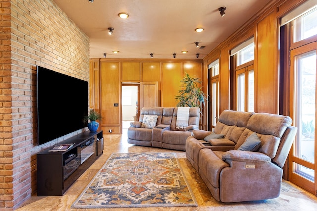 living room with ornamental molding