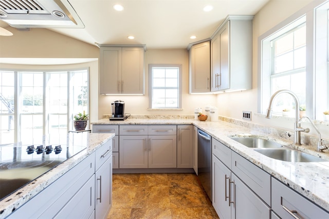 kitchen with gray cabinets and plenty of natural light