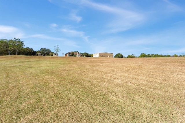 view of yard featuring a rural view