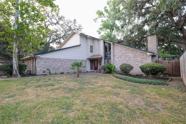 view of property featuring a front yard