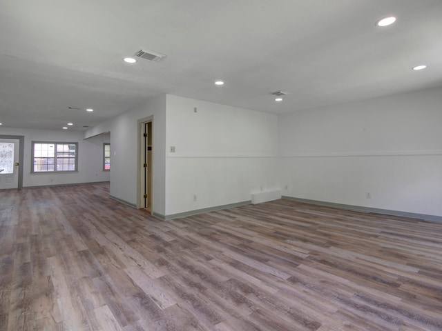 unfurnished room featuring light hardwood / wood-style floors