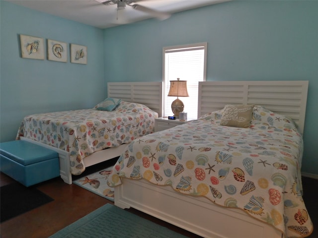 bedroom featuring wood-type flooring and ceiling fan