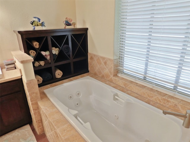 bathroom with a relaxing tiled tub