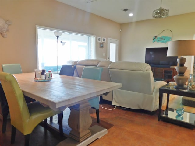 dining space featuring carpet