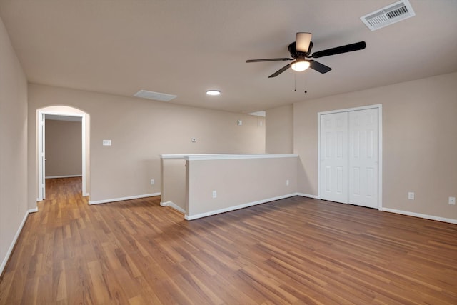 spare room with ceiling fan and hardwood / wood-style floors