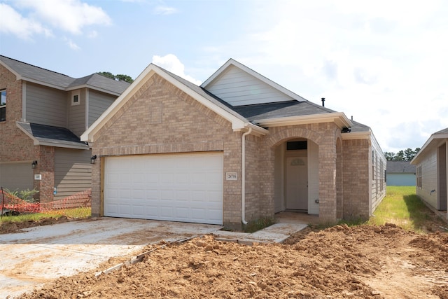 view of front of home with a garage