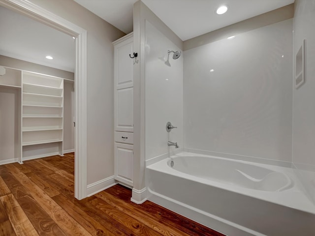 bathroom with shower / tub combination and wood-type flooring