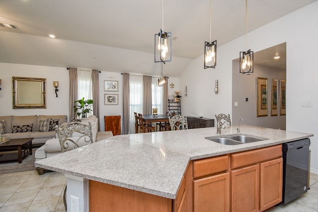 kitchen with black dishwasher, sink, a center island with sink, and pendant lighting