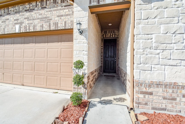 property entrance with a garage