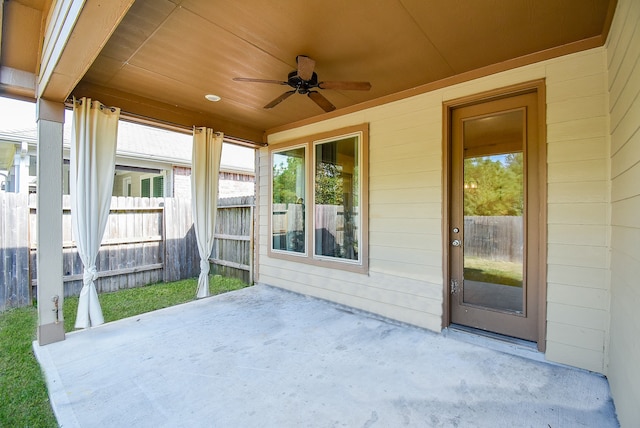 view of patio featuring ceiling fan