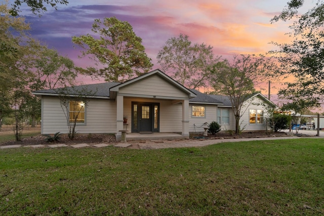1726 Bowler Rd, Waller, TX 77484 - ranch-style home featuring covered porch, roof with shingles, and a front lawn