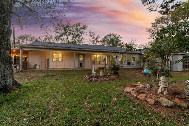 1726 Bowler Rd, Waller, TX 77484 - back of property at dusk with a lawn