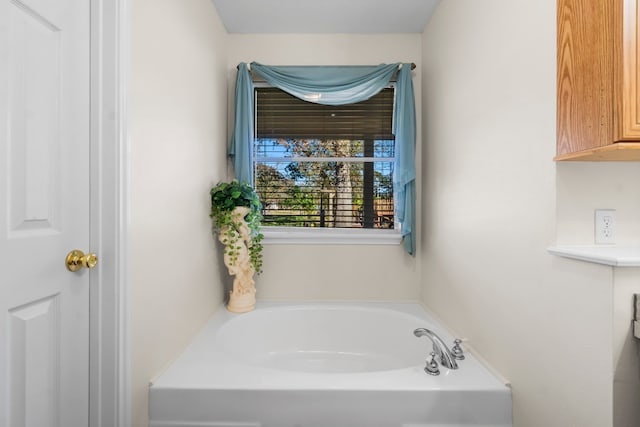 bathroom with a washtub