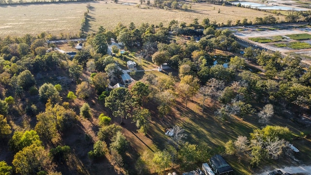 birds eye view of property featuring a rural view