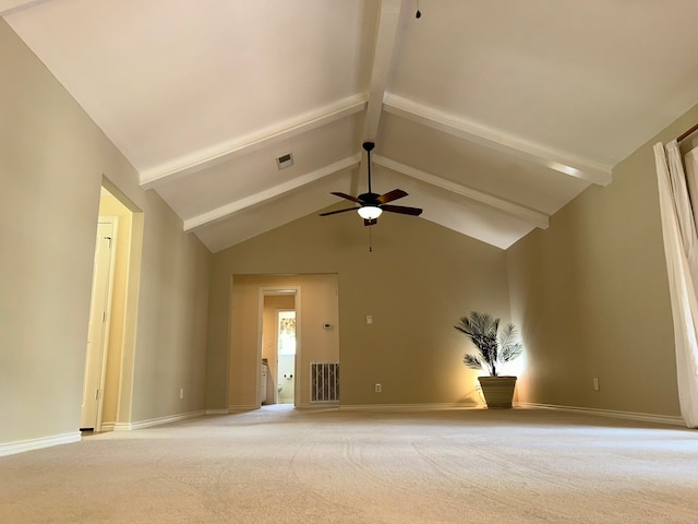 empty room featuring light carpet, beam ceiling, high vaulted ceiling, and ceiling fan