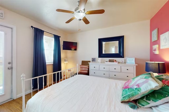 bedroom featuring ceiling fan and light wood-type flooring