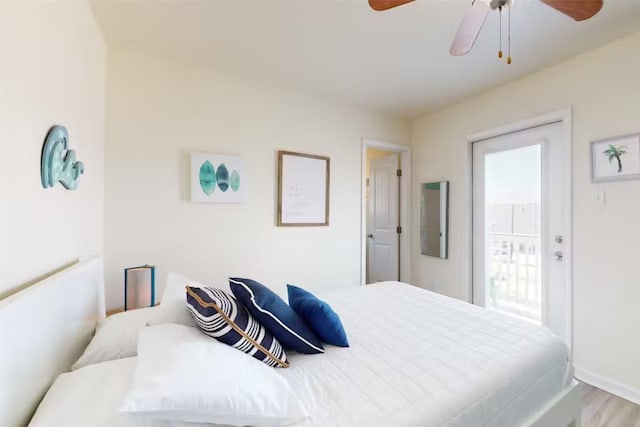 bedroom featuring hardwood / wood-style floors and ceiling fan