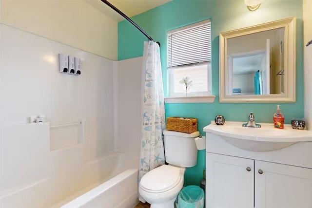 full bathroom featuring vanity, toilet, and shower / tub combo with curtain