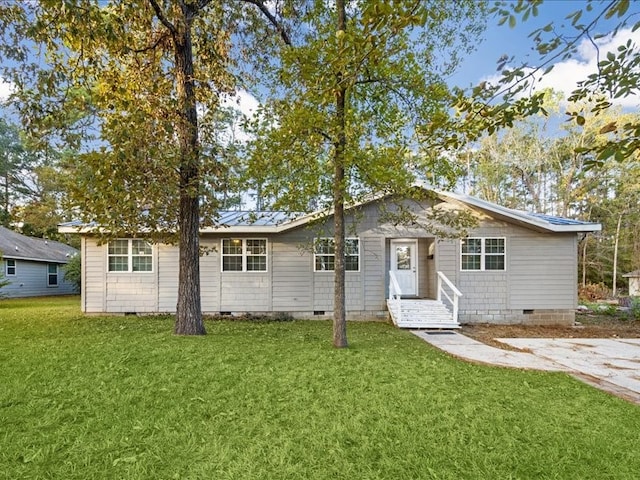 ranch-style home with a front yard