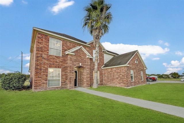 view of property with a front lawn