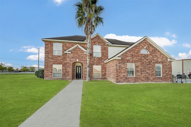 front facade featuring a front lawn